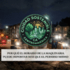 Maquinaria pesada circulando de noche cerca de una zona residencial